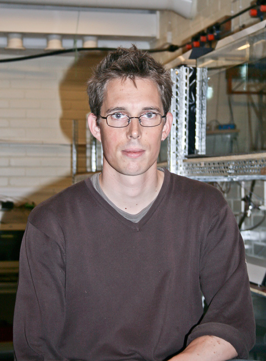 A person standing in a lab.